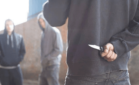 A man holding a knife in his hand.
