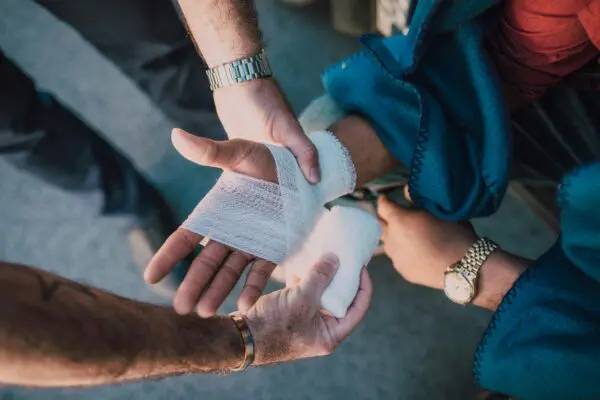 A person is cutting paper with scissors.